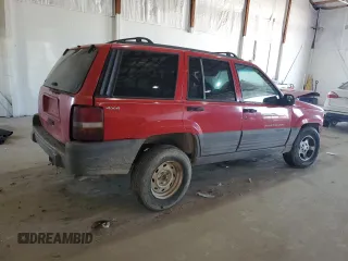 1998 Jeep Grand Cherokee Laredo с VIN 1J4GZ58S9WC368024, выставлен на аукционе Copart как лот 48304265 с пробегом Не указан миль и Списание • Salvage title. История ставок и продаж доступна на DreamBid. Изображение 3.