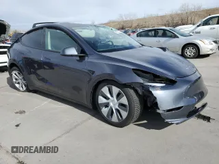 2023 Tesla Model Y Long Range with VIN 7SAYGAEE4PF873757, listed as a Copart auction lot 49530325 with 16,238 mi miles and Salvage Title. Bid and sale history available at DreamBid. Image 4.