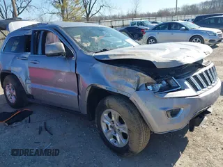 2014 Jeep Grand Cherokee Laredo with VIN 1C4RJFAG0EC289647, listed as a IAAI auction lot 41883914 with 176,501 mi miles and . Bid and sale history available at DreamBid. Image 1.