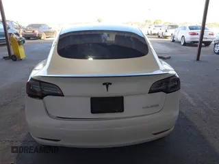 2021 Tesla Model 3 Performance with VIN 5YJ3E1EC4MF097993, listed as a IAAI auction lot 41366615 with 30,735 mi miles and . Bid and sale history available at DreamBid. Image 16.