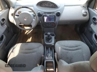 2003 Saturn ION ION 1 z VIN 1G8AF52F83Z151812, wystawiony jako Copart lot #77000594 z przebiegiem 313 620 mil mil oraz Szkoda całkowita • Salvage title. Historia ofert i sprzedaży dostępna na DreamBid. Obrazek 8.
