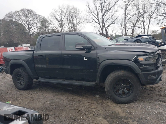 2022 Ram 1500 TRX with VIN 1C6SRFU9XNN476106, listed as a IAAI auction lot 41627895 with 21,992 mi miles and . Bid and sale history available at DreamBid. Image 13.