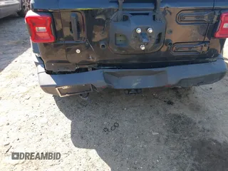 2020 Jeep Wrangler Unlimited Black and Tan with VIN 1C4HJXDGXLW219078, listed as a IAAI auction lot 41783437 with 59,137 mi miles and . Bid and sale history available at DreamBid. Image 6.