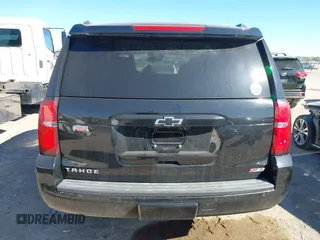 2017 Chevrolet Tahoe LT with VIN 1GNSKBKC6HR394138, listed as a IAAI auction lot 41852966 with 130,711 mi miles and . Bid and sale history available at DreamBid. Image 16.