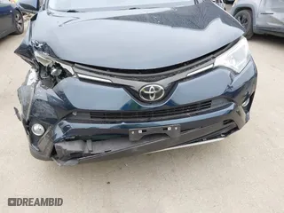 2018 Toyota RAV4 XLE with VIN JTMRFREV6JJ248098, listed as a IAAI auction lot 42042239 with 74,765 mi miles. Bid and sale history available at carsss.com. Image 6.