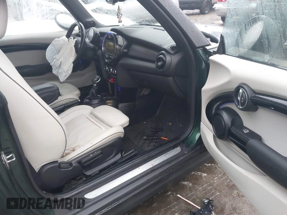 2017 MINI Convertible Cooper S z VIN WMWWG9C38H3C81071, wystawiony jako IAAI lot #41522738 z przebiegiem 59 040 mil mil oraz . Historia ofert i sprzedaży dostępna na DreamBid. Obrazek 5.