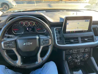 2021 Chevrolet Suburban RST z VIN 1GNSKEKD0MR457206, wystawiony jako Copart lot #87004944 z przebiegiem 139 570 mil mil oraz Czysty tytuł • Clean title. Historia ofert i sprzedaży dostępna na DreamBid. Obrazek 7.