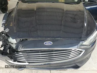 2020 Ford Fusion SE с VIN 3FA6P0HD5LR161189, выставлен на аукционе Copart как лот 62369585 с пробегом 100 440 миль миль и Списание • Salvage title. История ставок и продаж доступна на DreamBid. Изображение 11.