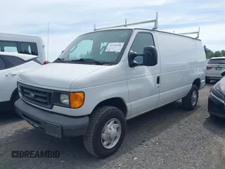 2007 Ford Econoline Cargo with VIN 1FTSE34LX7DB07866, listed as a IAAI auction lot 42731198 with 129,514 mi miles and . Bid and sale history available at DreamBid. Image 2.
