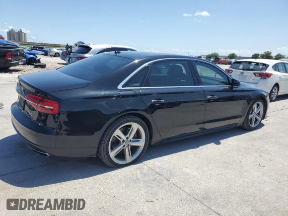 2018 Audi A8 z VIN WAU44AFD0JN000880, wystawiony jako Copart lot #54751235 z przebiegiem 76 161 mil mil oraz Szkody całkowita. Historia ofert i sprzedaży dostępna na DreamBid. Obrazek 3.