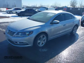 2014 Volkswagen CC Sport with VIN WVWBP7AN5EE508465, listed as a IAAI auction lot 41403844 with 97,445 mi miles and . Bid and sale history available at DreamBid. Image 2.