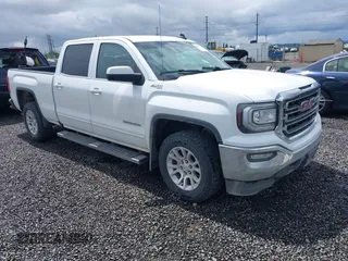 2018 GMC Sierra 1500 SLE z VIN 3GTU2MECXJG454372, wystawiony jako IAAI lot #42237766 z przebiegiem 132 904 mil mil oraz . Historia ofert i sprzedaży dostępna na DreamBid. Obrazek 1.