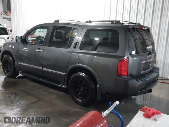 2004 Infiniti QX56 with VIN 5N3AA08C14N812225, listed as a IAAI auction lot 41496326 with 213,916 mi miles. Bid and sale history available at carsss.com. Image 3.