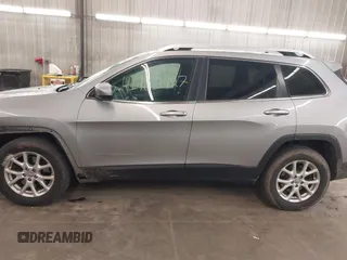 2014 Jeep Cherokee Altitude with VIN 1C4PJMCB9EW149754, listed as a IAAI auction lot 41983427 with 199,810 mi miles and . Bid and sale history available at DreamBid. Image 15.