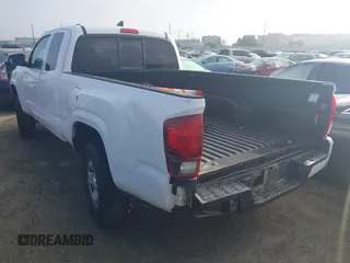 2019 Toyota Tacoma SR with VIN 5TFSX5EN0KX066774, listed as a IAAI auction lot 41534797 with 153,172 mi miles and . Bid and sale history available at DreamBid. Image 3.