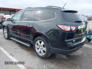2014 Chevrolet Traverse LTZ with VIN 1GNKRJKD1EJ203282, listed as a IAAI auction lot 41984380 with 219,819 mi miles and . Bid and sale history available at DreamBid. Image 3.