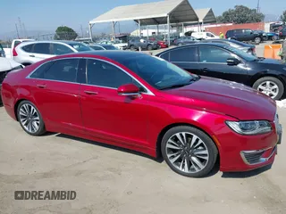 2019 Lincoln MKZ Hybrid Reserve II with VIN 3LN6L5MU7KR617325, listed as a IAAI auction lot 42584481 with 76,118 mi miles and . Bid and sale history available at DreamBid. Image 13.