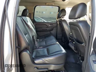 2011 Chevrolet Suburban z VIN 1GNWK5EG0BR121950, wystawiony jako Copart lot #82678394 z przebiegiem 154 952 mil mil oraz Szkoda całkowita • Salvage title. Historia ofert i sprzedaży dostępna na DreamBid. Obrazek 11.