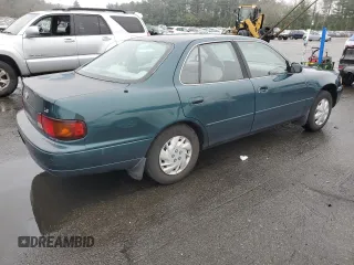 1996 Toyota Camry DX with VIN 4T1BG12K5TU670189, listed as a Copart auction lot 52913255 with 156,737 mi miles and Clean Title. Bid and sale history available at carsss.com. Image 3.