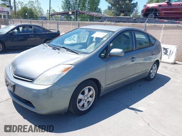 2005 Toyota Prius with VIN JTDKB20U553008263, listed as a IAAI auction lot 42149210 with 235,510 mi miles. Bid and sale history available at carsss.com. Image 2.