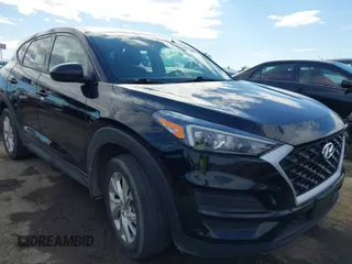 2021 Hyundai Tucson SE with VIN KM8J23A4XMU303220, listed as a IAAI auction lot 41436305 with 71,216 mi miles. Bid and sale history available at carsss.com. Image 1.