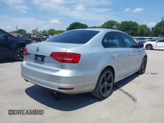 2015 Volkswagen Jetta S with VIN 3VW2K7AJ8FM217026, listed as a IAAI auction lot 42395393 with 181,789 mi miles and . Bid and sale history available at DreamBid. Image 4.