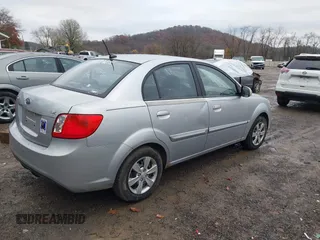2010 Kia Rio LX with VIN KNADH4A37A6645279, listed as a IAAI auction lot 40856780 with 165,385 mi miles. Bid and sale history available at carsss.com. Image 4.