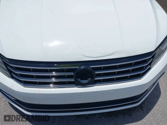 2016 Volkswagen Passat S z VIN 1VWAT7A33GC056162, wystawiony jako IAAI lot #42476725 z przebiegiem 88 872 mil mil oraz . Historia ofert i sprzedaży dostępna na DreamBid. Obrazek 18.
