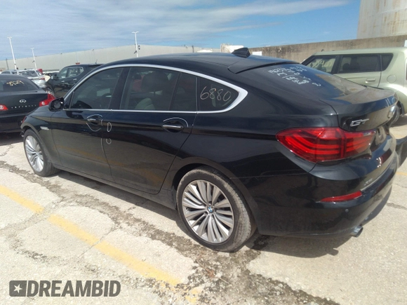 2015 BMW 5 Series 535i Gran Turismo xDrive with VIN WBA5M4C53FD184034, listed as a IAAI auction lot 34956880 with 86,657 mi miles and . Bid and sale history available at DreamBid. Image 3.