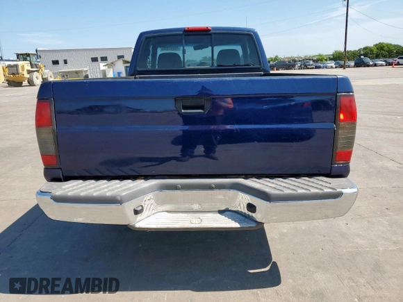 1999 Nissan Frontier XE with VIN 1N6DD26S9XC307893, listed as a Copart auction lot 66045605 with 239,269 mi miles and Salvage title. Bid and sale history available at DreamBid. Image 6.