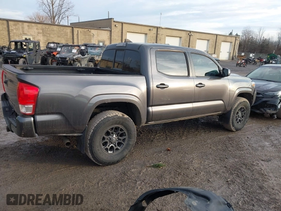 2016 Toyota Tacoma SR5 with VIN 5TFAX5GN1GX056450, listed as a IAAI auction lot 41215339 with 129,604 mi miles. Bid and sale history available at carsss.com. Image 4.