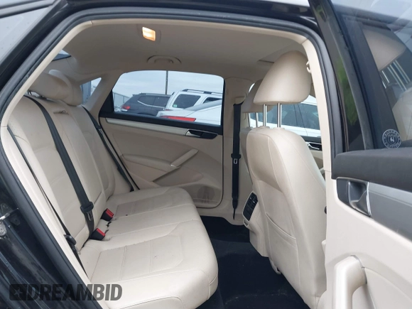 2019 Volkswagen Passat 2.0T Wolfsburg Edition with VIN 1VWLA7A36KC007173, listed as a IAAI auction lot 41357381 with 79,356 mi miles. Bid and sale history available at carsss.com. Image 8.