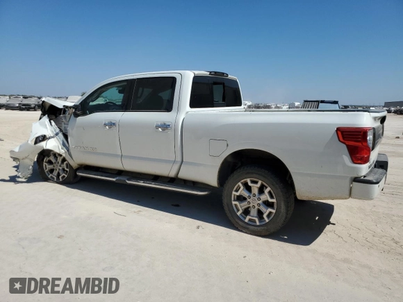 2016 Nissan Titan XD PRO-4X with VIN 1N6BA1F41GN510616, listed as a Copart auction lot 76314474 with 167,093 mi miles and Salvage Title. Bid and sale history available at carsss.com. Image 2.