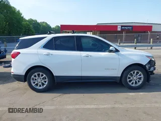 2019 Chevrolet Equinox LT z VIN 3GNAXKEV8KS599992, wystawiony jako IAAI lot #42159136 z przebiegiem 85 522 mil mil oraz . Historia ofert i sprzedaży dostępna na DreamBid. Obrazek 13.
