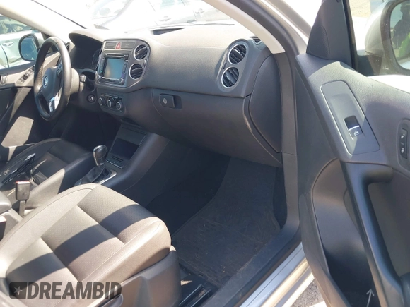 2011 Volkswagen Tiguan SE with VIN WVGBV7AX7BW529097, listed as a IAAI auction lot 42182690 with 139,878 mi miles and . Bid and sale history available at DreamBid. Image 5.