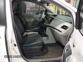 2014 Toyota Sienna SE with VIN 5TDXK3DC7ES497390, listed as a IAAI auction lot 42037096 with 169,127 mi miles and . Bid and sale history available at DreamBid. Image 5.