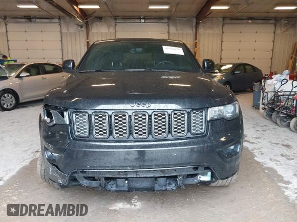 2017 Jeep Grand Cherokee Laredo with VIN 1C4RJFAG3HC841307, listed as a IAAI auction lot 42326035 with 132,655 mi miles and . Bid and sale history available at DreamBid. Image 12.