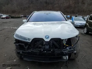 2023 BMW iX xDrive50 with VIN WB523CF09PCL96538, listed as a Copart auction lot 44728454 with 33,929 mi miles. Bid and sale history available at carsss.com. Image 5.