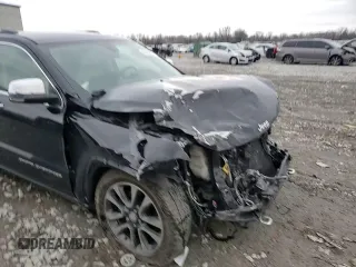 2018 Jeep Grand Cherokee Overland z VIN 1C4RJFCT7JC435403, wystawiony jako Copart lot #86568024 z przebiegiem 105 681 mil mil oraz Szkoda całkowita • Salvage title. Historia ofert i sprzedaży dostępna na DreamBid. Obrazek 11.