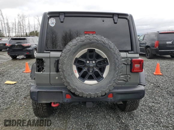 2018 Jeep Wrangler Unlimited Rubicon with VIN 1C4HJXFNXJW196460, listed as a Copart auction lot 49681715 with 71,187 mi miles and Salvage title. Bid and sale history available at DreamBid. Image 6.