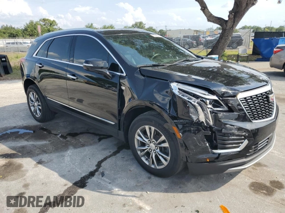 2022 Cadillac XT5 FWD Premium Luxury z VIN 1GYKNCRS7NZ101131, wystawiony jako Copart lot #56365065 z przebiegiem 74 168 mil mil oraz Szkoda całkowita • Salvage title. Historia ofert i sprzedaży dostępna na DreamBid. Obrazek 4.