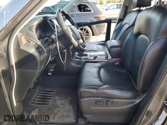 2017 Nissan Armada Platinum z VIN JN8AY2NF1H9300454, wystawiony jako Copart lot #49198605 z przebiegiem 109 546 mil mil oraz Szkoda całkowita • Salvage title. Historia ofert i sprzedaży dostępna na DreamBid. Obrazek 7.