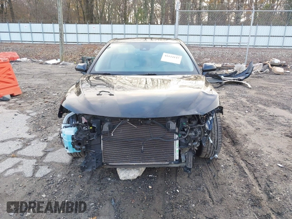 2022 Toyota Camry SE with VIN 4T1G11AK4NU640970, listed as a IAAI auction lot 41124147 with 33,472 mi miles and . Bid and sale history available at DreamBid. Image 6.