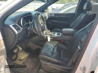 2016 Jeep Grand Cherokee Overland with VIN 1C4RJFCG3GC364485, listed as a Copart auction lot 60727935 with 101,742 mi miles and Salvage title. Bid and sale history available at DreamBid. Image 7.