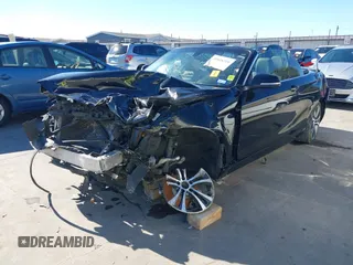 2015 BMW 2 Series 228i with VIN WBA1K5C57FV473826, listed as a IAAI auction lot 41866820 with 130,823 mi miles. Bid and sale history available at carsss.com. Image 2.