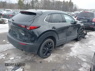 2021 Mazda CX-30 Premium with VIN 3MVDMBDY1MM269353, listed as a IAAI auction lot 41644391 with 29,409 mi miles and . Bid and sale history available at carsss.com. Image 4.