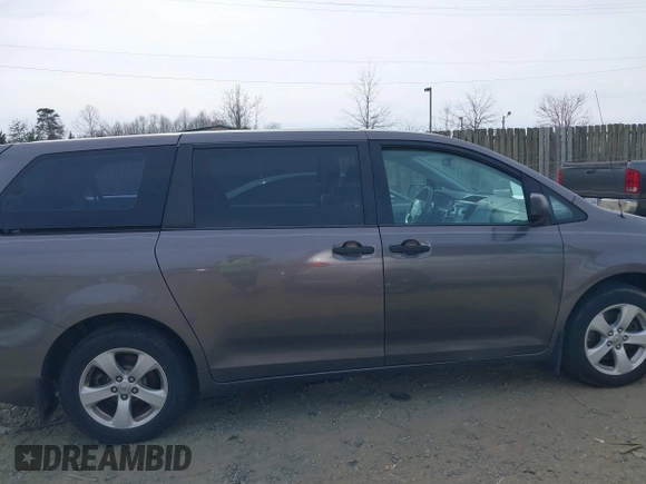 2012 Toyota Sienna with VIN 5TDKA3DC9CS011298, listed as a IAAI auction lot 41843980 with 158,787 mi miles and . Bid and sale history available at DreamBid. Image 14.