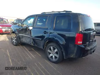 2012 Honda Pilot Touring with VIN 5FNYF4H93CB077057, listed as a IAAI auction lot 41156160 with 139,834 mi miles and . Bid and sale history available at DreamBid. Image 3.