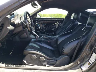 2005 Nissan 350Z Enthusiast z VIN JN1AZ34DX5M607390, wystawiony jako Copart lot #57277905 z przebiegiem 97 629 mil mil oraz Tytuł czysty. Historia ofert i sprzedaży dostępna na DreamBid. Obrazek 7.
