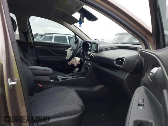 2019 Hyundai Santa Fe SE z VIN 5NMS23AD2KH014037, wystawiony jako IAAI lot #42110778 z przebiegiem 48 975 mil mil oraz . Historia ofert i sprzedaży dostępna na DreamBid. Obrazek 5.